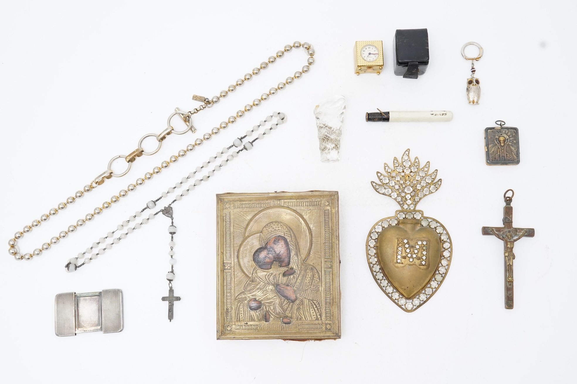 A collection of jewels and accessories including a Russian icon, comprising: a white glass bead rosary; a gilt metal and paste sacred heart motif for wall mounting, length 15.5cm; a gilt metal cube-shaped Nepro alarm clo
